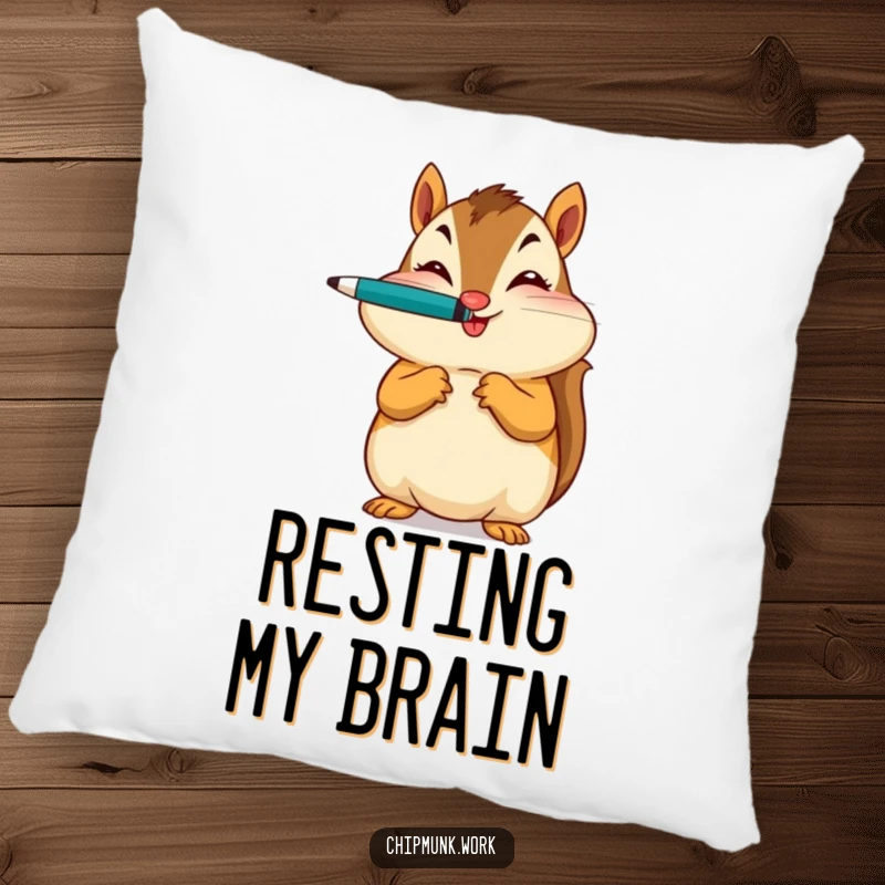 Funny pillow with a chipmunk balancing a pen on its nose and winking, offering cozy and humorous decor.